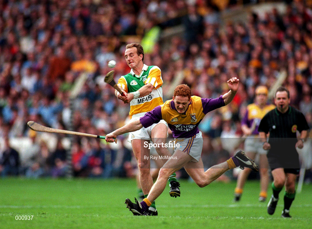 22 June 1997; Joe Dooley of Offaly in action against Rod Guiney of Wexford during the GAA Leinster Senior Hurling Championship Semi-Final match between Wexford and Offaly at Croke Park in Dublin. Photo by Ray McManus/Sportsfile