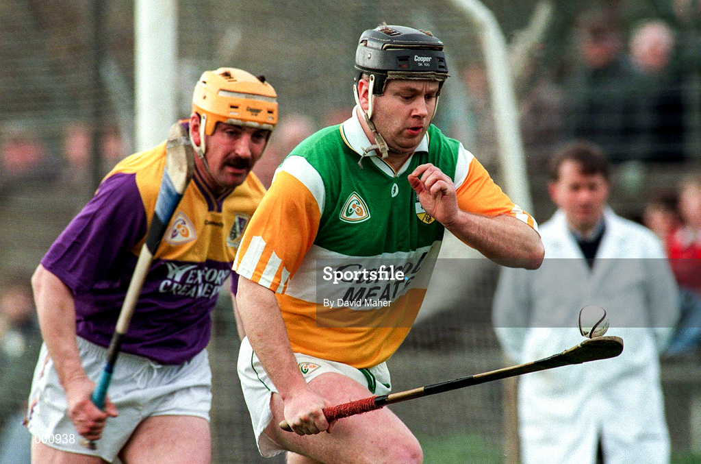 23 March 1997; Joe Errity of Offaly in action against Billy Byrne of Wexford during the National Hurling League Division 1 match between Offaly and Wexford at St. Brendan's Park in Birr, Offaly. Photo by David Maher/Sportsfile