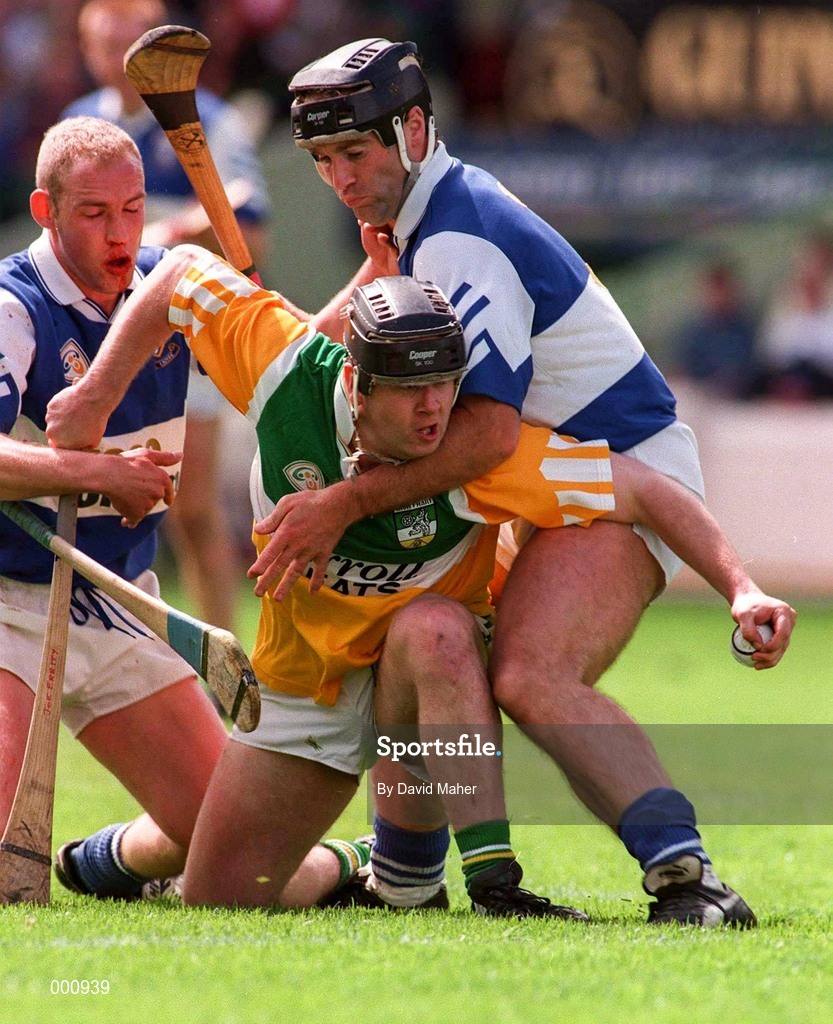 8 June 1997; Joe Errity of Offaly in action against Cyril Duggan, right, and Declan Conroy of Laois, during the GAA Leinster Senior Hurling Championship Quarter-Final match between Offaly and Laois at Croke Park in Dublin. Photo by David Maher/Sportsfile