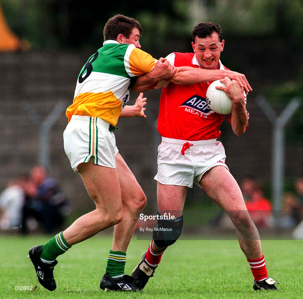 29 June 1997; John Donaldson of Louth holds off the challenge from Ciaran McManus of Offaly during the Leinster GAA Senior Football Championship Semi-Final match between Offaly and Louth at Páirc Tailteann in Navan, Co Meath. Photo by Ray McManus/Sportsfile