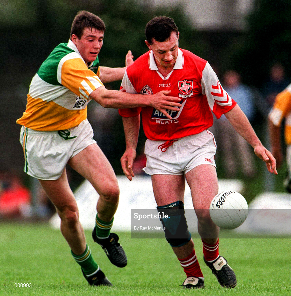 29 June 1997; John Donaldson of Louth holds off the challenge from Ciaran McManus of Offaly during the Leinster GAA Senior Football Championship Semi-Final match between Offaly and Louth at Páirc Tailteann in Navan, Co Meath. Photo by Ray McManus/Sportsfile