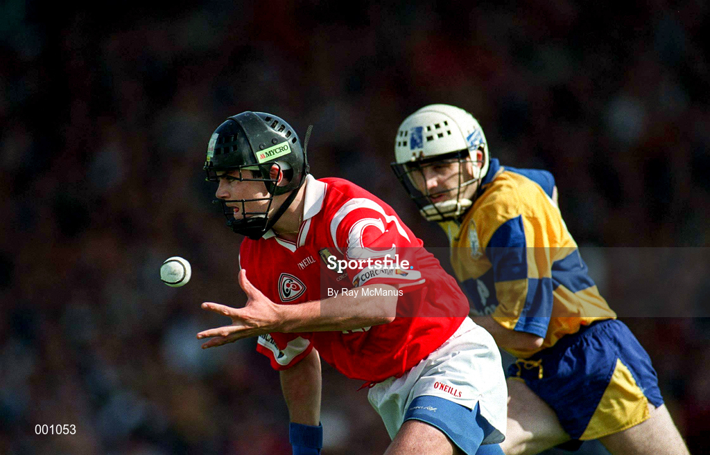 8 June 1997; John O'Driscoll of Cork in action against Ger O'Loughlin of Clare during the GAA Munster Senior Hurling Championship Semi-Final match between Clare and Cork at the Gaelic Grounds in Limerick. Photo by Ray McManus/Sportsfile