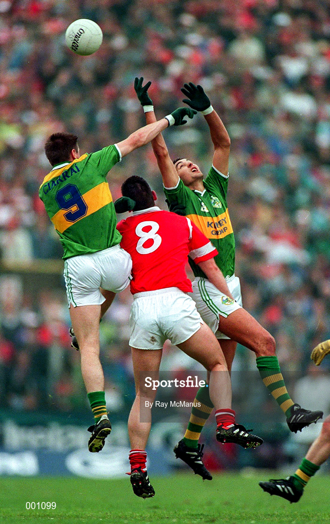 21 July 1996; Maurice Fitzgerald, right, and Dara O'Sé of Kerry in action against Cork's Liam Honohan, 8, during the Munster Football Final match between Cork and Kerry at Páirc Uí Chaoimh in Cork. Photo by Ray McManus/Sportsfile