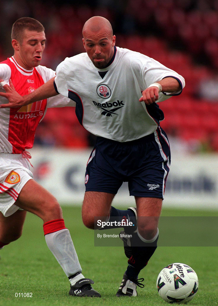 25 July 1998; Arnar Gunnlaugsen of Bolton Wanderers in action against Trevor Croly of St. Patrick's Athletic during the Club Friendly between St. Patrick's Athletic and Bolton Wanderers at Richmond Park in Dublin. Photo by Brendan Moran/Sportsfile