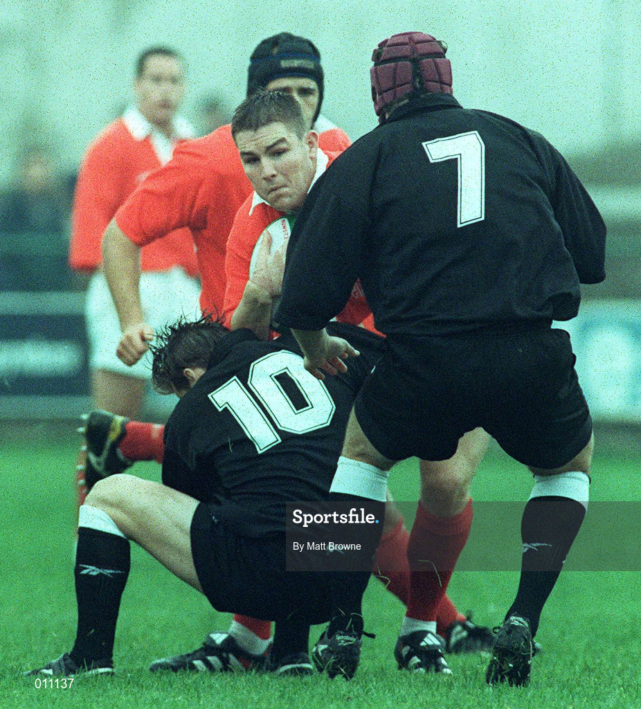 26 September 1998; Brian Roche of Munster is tackled by Matthew McCarthy, 10, and Brett Sinkinson of Neath during the Heineken Cup Pool B Round 2 match between Munster and Neath at Musgrave Park in Cork. Photo by Matt Browne/Sportsfile
