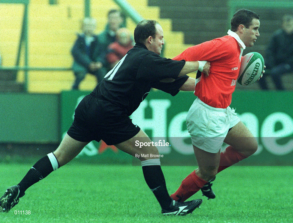 26 September 1998; Brian Roche of Munster is tackled by Ian Jones of Neath during the Heineken Cup Pool B Round 2 match between Munster and Neath at Musgrave Park in Cork. Photo by Matt Browne/Sportsfile