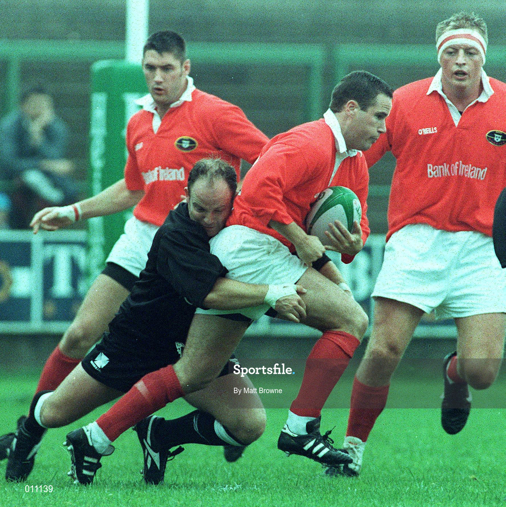 26 September 1998; Brian Roche of Munster is tackled by Ian Jones of Neath during the Heineken Cup Pool B Round 2 match between Munster and Neath at Musgrave Park in Cork. Photo by Matt Browne/Sportsfile
