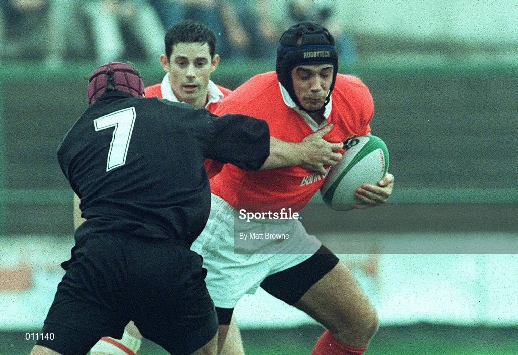 26 September 1998; Alan Quinlan of Munster is tackled by Brett Sinkinson of Neath during the Heineken Cup Pool B Round 2 match between Munster and Neath at Musgrave Park in Cork. Photo by Matt Browne/Sportsfile