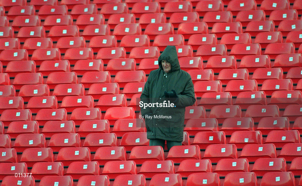 17 November 1996; A lone supporter listens to a radio during the Harp Lager National League Premier Division match between Shamrock Rovers and Cork City at Tolka Park in Dublin. Photo by Ray McManus/Sportsfile
