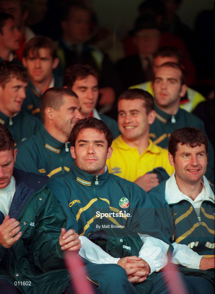 2 September 1998;  Republic of Ireland senior team players, including Denis Irwin, Jeff Kenna and Roy Keane, watch on during the Under-18 International Friendly between Republic of Ireland and England at Tolka Park in Dublin. Photo by Matt Browne/Sportsfile