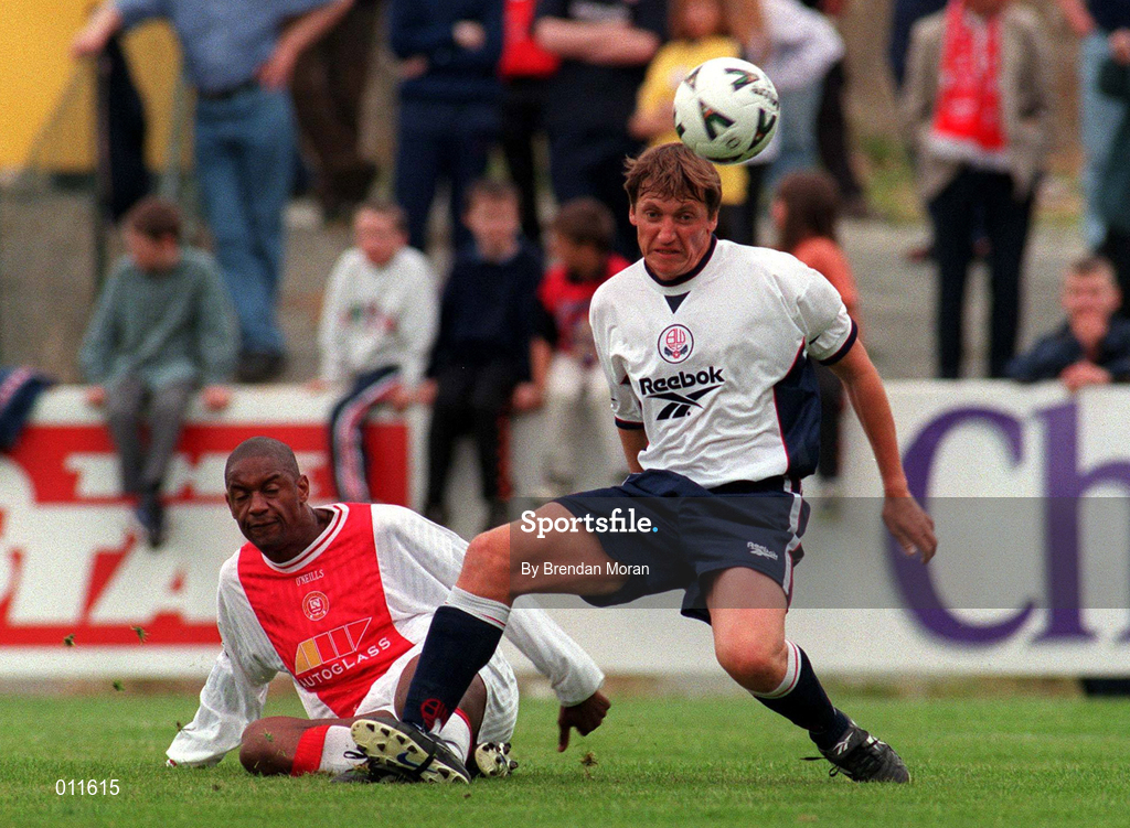 25 July 1998; Jimmy Phillips of Bolton Wanderers in action against Leon Braithwaite of St. Patrick's Athletic during the Club Friendly between St. Patrick's Athletic and Bolton Wanderers at Richmond Park in Dublin. Photo by Brendan Moran/Sportsfile