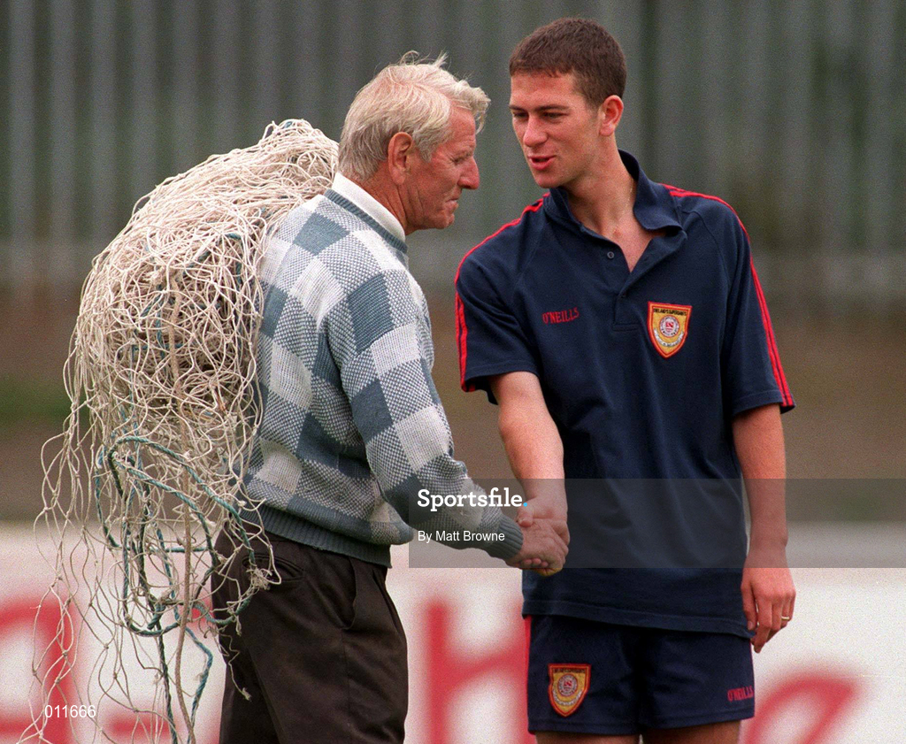 28 July 1998; St. Patrick's Athletic groundsman Harry Boland, left, greets UEFA U18 European Championship medal winner Keith Doyle during a St. Patrick's Athletic Training Session at Richmond Park in Dublin. Photo by Matt Browne/Sportsfile