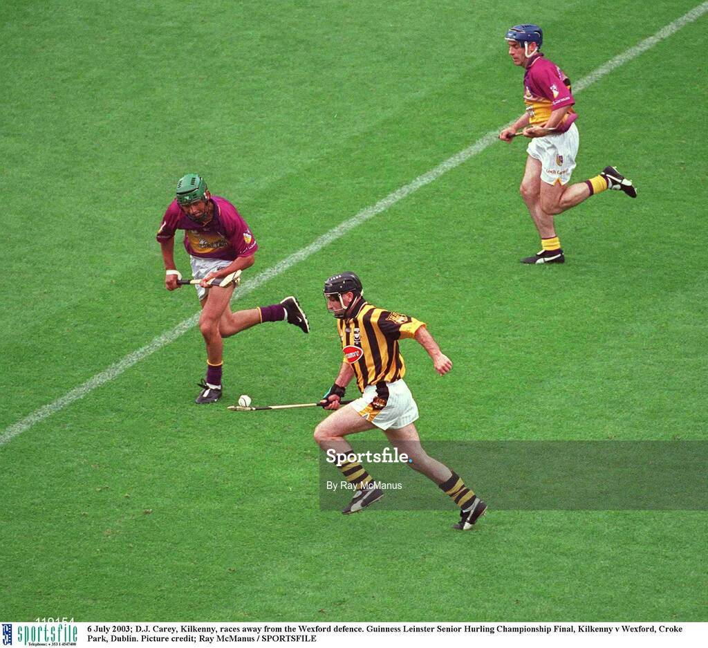 6 July 2003; DJ Carey of Kilkenny races away from the Keith Rossiter and Liam Dunne, right, of Wexford. Guinness Leinster Senior Hurling Championship Final, Kilkenny v Wexford, Croke Park, Dublin. Picture credit; Ray McManus / SPORTSFILE