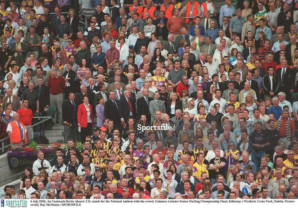 6 July 2003; An Taoiseach Bertie Ahearn TD stands for the National Anthem with the crowd. Guinness Leinster Senior Hurling Championship Final, Kilkenny v Wexford, Croke Park, Dublin. Picture credit; Ray McManus / SPORTSFILEAmhrán na bhFiann