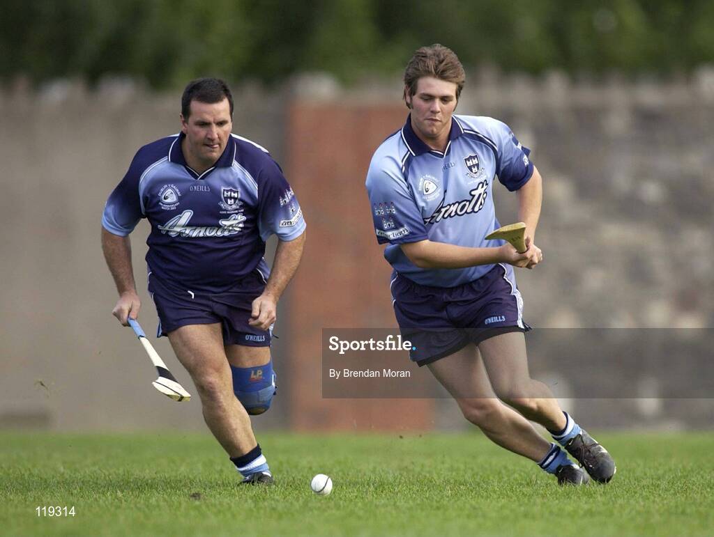 26 July 2003; Westlife singer Bryan McFadden playing for Dublin, in action against Ken Lucas, Galway (dark blue). Aoife McGrane - King Benefit match, Dublin v Galway Minor Hurling teams of 1983, St Vincent's GAA Club Grounds, Marino, Dublin. Picture credit; Brendan Moran / SPORTSFILE *EDI*