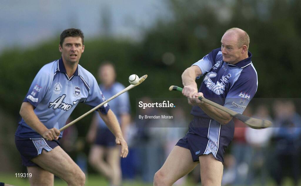 26 July 2003; Sean Treacy, Galway, in action against former Republic of Ireland soccer international Niall Quinn, Dublin . Aoife McGrane - King Benefit match, Dublin v Galway Minor Hurling teams of 1983, St Vincent's GAA Club Grounds, Marino, Dublin. Picture credit; Brendan Moran / SPORTSFILE *EDI*