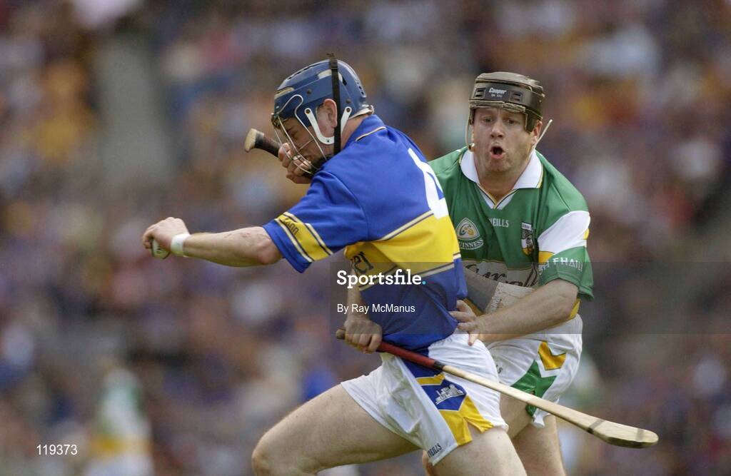 27 July 2003; Martin Maher of Tipperary in action against Joe Errity of Offaly during the Guinness All-Ireland Senior Hurling Championship Quarter Final match between Offaly and Tipperary at Croke Park in Dublin. Photo by Ray McManus/Sportsfile