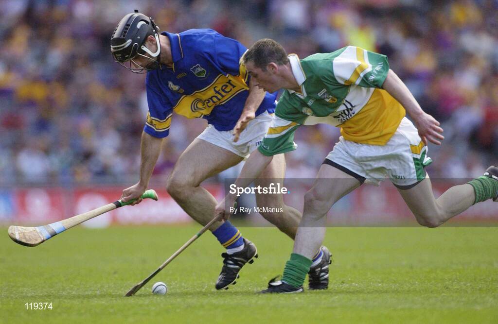 27 July 2003; Michael Cordial of Offaly in action against Thomas Dunne of Tipperary during the Guinness All-Ireland Senior Hurling Championship Quarter Final match between Offaly and Tipperary at Croke Park in Dublin. Photo by Ray McManus/Sportsfile