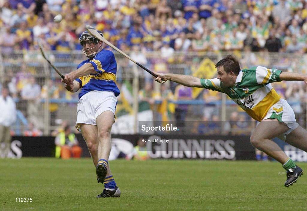 27 July 2003; Mark O'Leary of Tipperary in action against Colm Cassidy of Offaly during the Guinness All-Ireland Senior Hurling Championship Quarter Final match between Offaly and Tipperary at Croke Park in Dublin. Photo by Pat Murphy / Sportsfile
