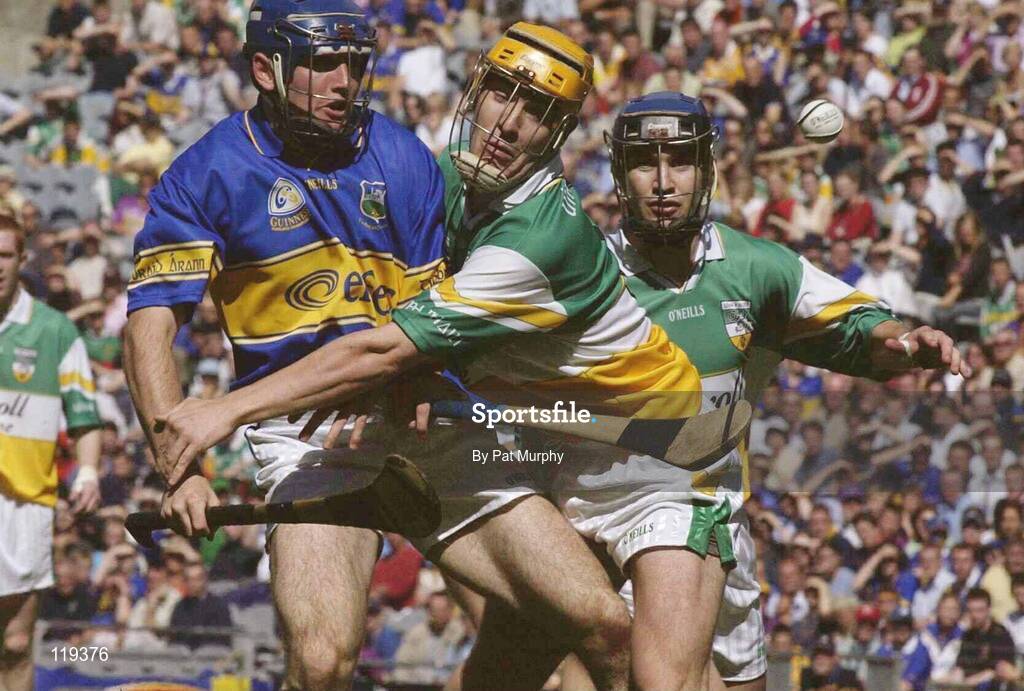 27 July 2003; Eoin Kelly of Tipperary in action against Ger Oakley of Offaly during the Guinness All-Ireland Senior Hurling Championship Quarter Final match between Offaly and Tipperary at Croke Park in Dublin. Photo by Pat Murphy / Sportsfile