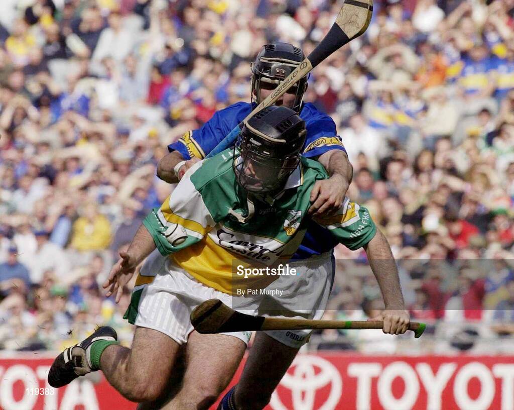 27 July 2003; Thomas Costello of Tipperary in action against Damien Murray of Offaly during the Guinness All-Ireland Senior Hurling Championship Quarter Final match between Offaly and Tipperary at Croke Park in Dublin. Photo by Pat Murphy / Sportsfile