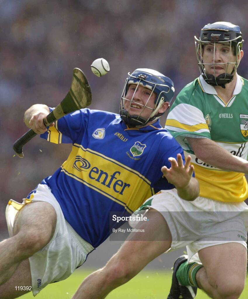 27 July 2003; Eoin Kelly of Tipperary in action against David Franks of Offaly during the Guinness All-Ireland Senior Hurling Championship Quarter Final match between Offaly and Tipperary at Croke Park in Dublin. Photo by Ray McManus/Sportsfile