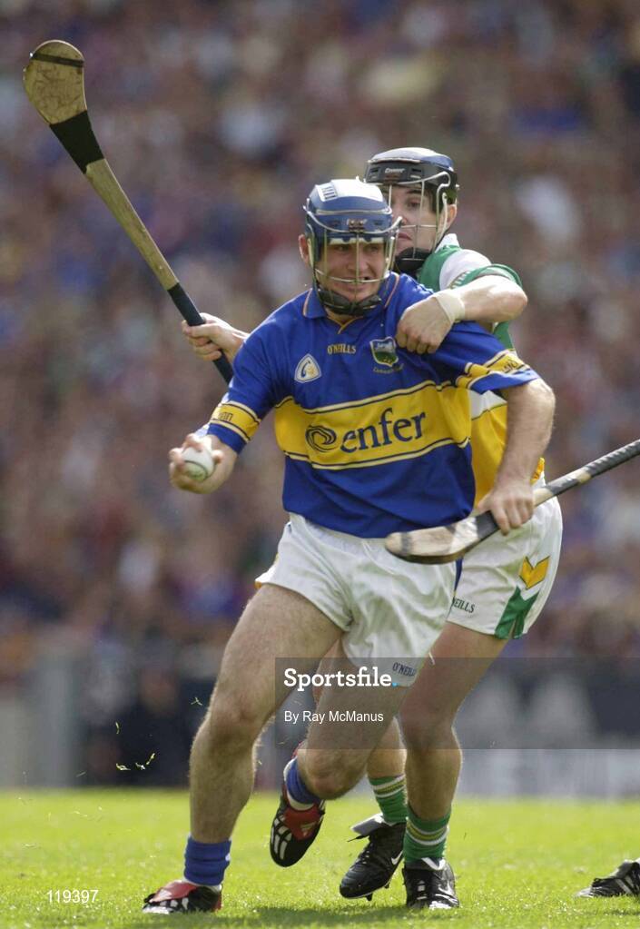 27 July 2003; Eoin Kelly of Tipperary in action against David Franks of Offaly during the Guinness All-Ireland Senior Hurling Championship Quarter Final match between Offaly and Tipperary at Croke Park in Dublin. Photo by Ray McManus/Sportsfile