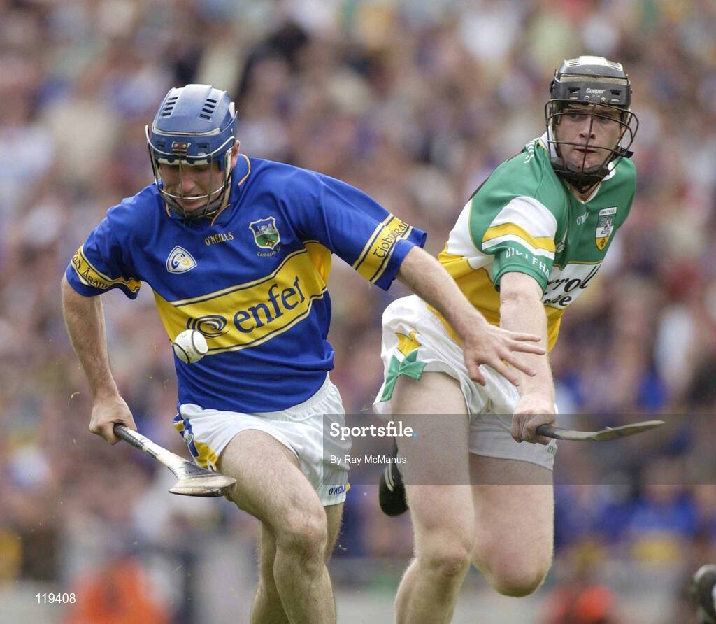 27 July 2003; Eoin Kelly of Tipperary in action against Rory Hannify of Offaly during the Guinness All-Ireland Senior Hurling Championship Quarter Final match between Offaly and Tipperary at Croke Park in Dublin. Photo by Ray McManus/Sportsfile