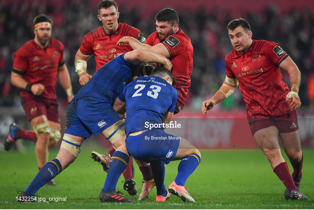 26 December 2017; Kevin O'Byrne of Munster is tackled by Dan Leavy and Noel Reid of Leinster during the Guinness PRO14 Round 11 match between Munster and Leinster at Thomond Park in Limerick. Photo by Brendan Moran/Sportsfile
