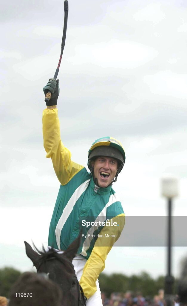 30 July 2003; Jockey Robert Power celebrates winning the Hewlett-Packard Galway Plate aboard Nearly A Moose. Galway Racing Festival, Ballybrit, Galway. Picture credit; Brendan Moran / SPORTSFILE *EDI*
