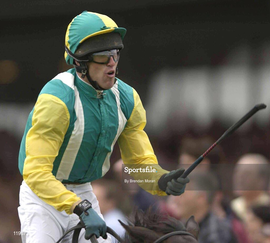 30 July 2003; Jockey Robert Power, aboard Nearly A Moose, celebrates winning the Hewlett-Packard Galway Plate. Galway Racing Festival, Ballybrit, Galway. Picture credit; Brendan Moran / SPORTSFILE *EDI*