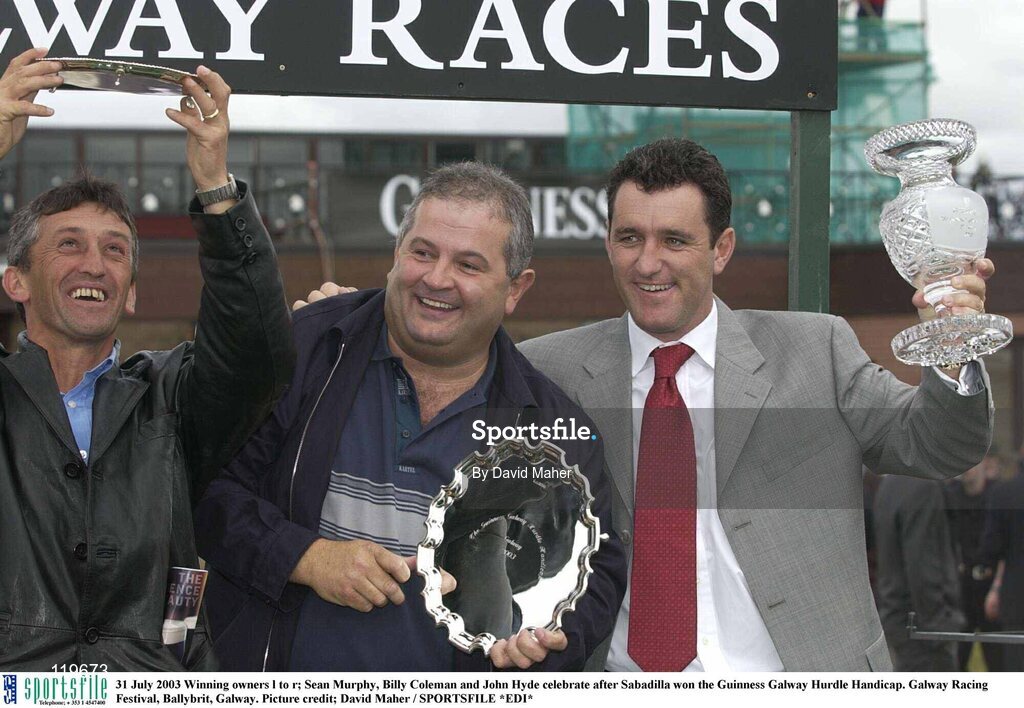 31 July 2003 Winning owners l to r; Sean Murphy, Billy Coleman and John Hyde celebrate after Sabadilla won the Guinness Galway Hurdle Handicap. Galway Racing Festival, Ballybrit, Galway. Picture credit; David Maher / SPORTSFILE *EDI*