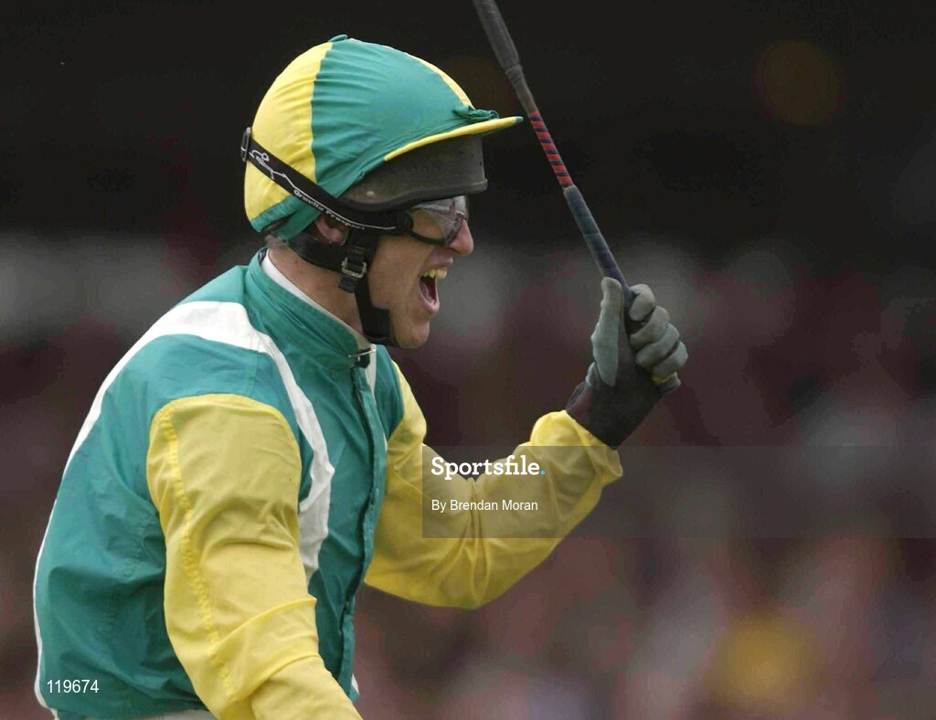 30 July 2003; Jockey Robert Power, aboard Nearly A Moose, celebrates winning the Hewlett-Packard Galway Plate. Galway Racing Festival, Ballybrit, Galway. Picture credit; Brendan Moran / SPORTSFILE *EDI*