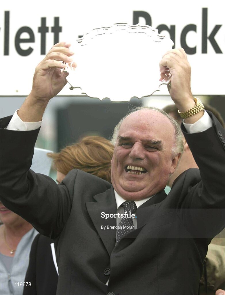 30 July 2003; Winning Owner Michael McGinley celebrates after his horse Nearly A Moose won the Hewlett-Packard Galway Plate. Galway Racing Festival, Ballybrit, Galway. Picture credit; Brendan Moran / SPORTSFILE *EDI*