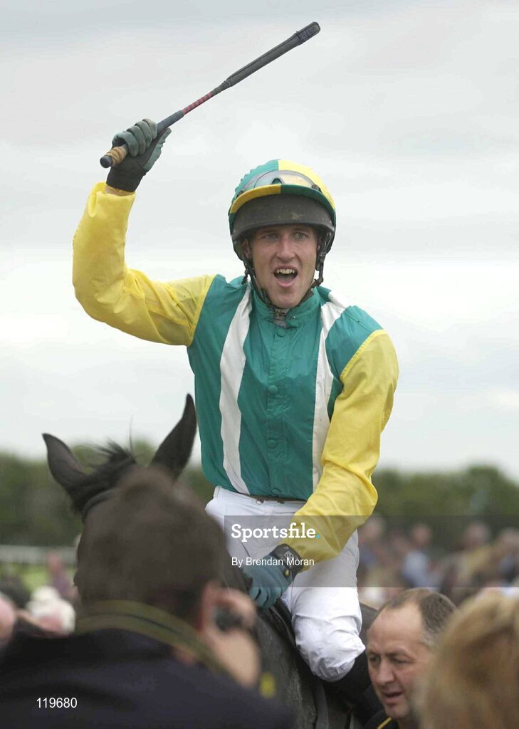 30 July 2003; Jockey Robert Power celebrates winning the Hewlett-Packard Galway Plate aboard Nearly A Moose. Galway Racing Festival, Ballybrit, Galway. Picture credit; Brendan Moran / SPORTSFILE *EDI*