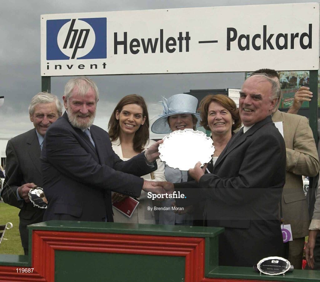 30 July 2003; Winning Owner Michael McGinley is presented with the Hewlett-Packard Galway Plate by Rory O'Connor, Managing Director, Hewlett-Packard Galway Ltd, in the presence of the winning connections of Nearly A Moose. Galway Racing Festival, Ballybrit, Galway. Picture credit; Brendan Moran / SPORTSFILE *EDI*