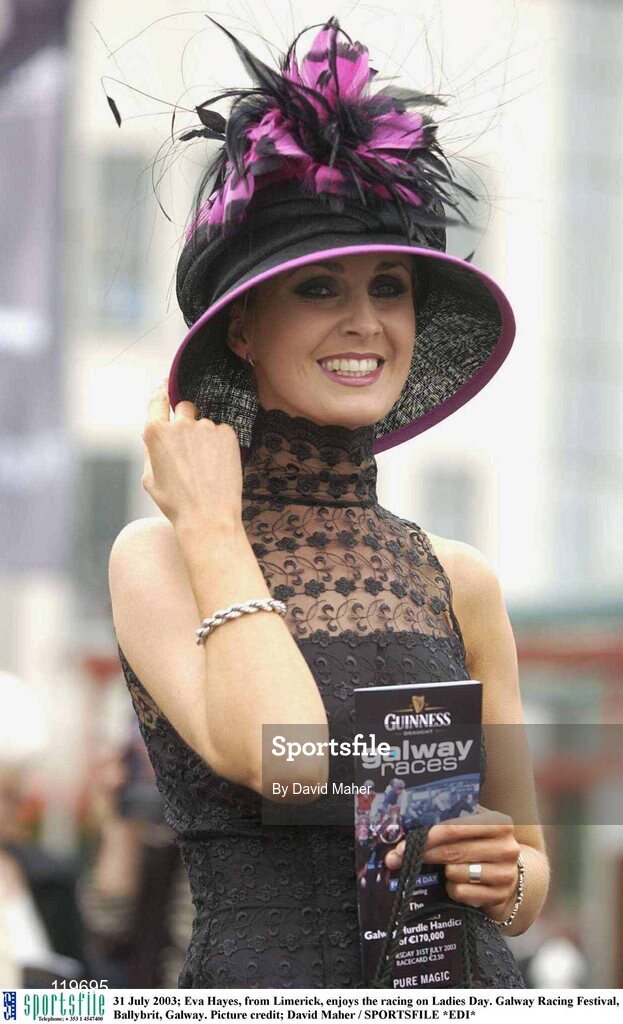 31 July 2003; Eva Hayes, from Limerick, enjoys the racing on Ladies Day. Galway Racing Festival, Ballybrit, Galway. Picture credit; David Maher / SPORTSFILE *EDI*