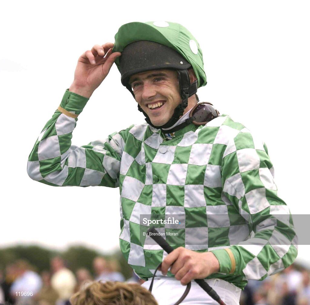 30 July 2003; Ruby Walsh acknowledges the crowd's applause after winning the HP Software Licensing Management Solutions Handicap Hurdle aboard Jaguar Claw. Galway Racing Festival, Ballybrit, Galway. Picture credit; Brendan Moran / SPORTSFILE *EDI*
