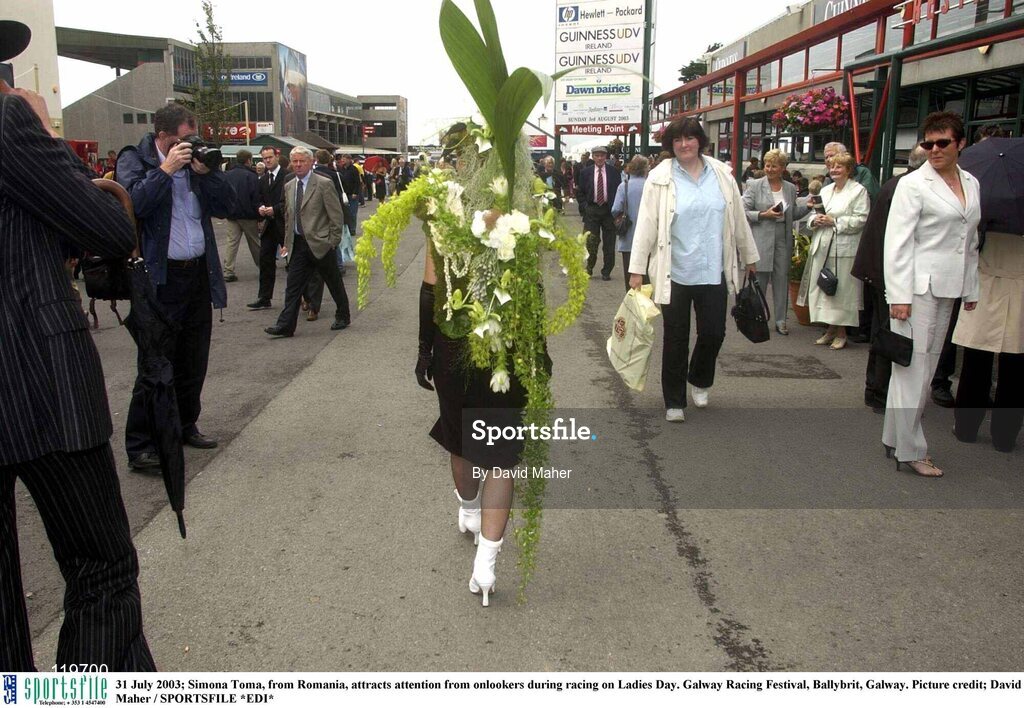 31 July 2003; Simona Toma, from Romania, attracts attention from onlookers during racing on Ladies Day. Galway Racing Festival, Ballybrit, Galway. Picture credit; David Maher / SPORTSFILE *EDI*