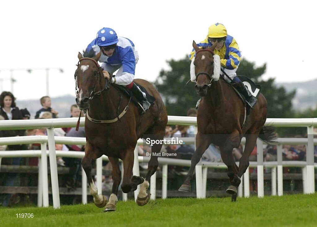30 July 2003; Doonaree, with Fran Berry up, wins the HP Software Publishing Services Handicap from second placed Pease Blossom with Catherine Gannon, right. Galway Racing Festival, Ballybrit, Galway. Picture credit; Matt Browne / SPORTSFILE *EDI*