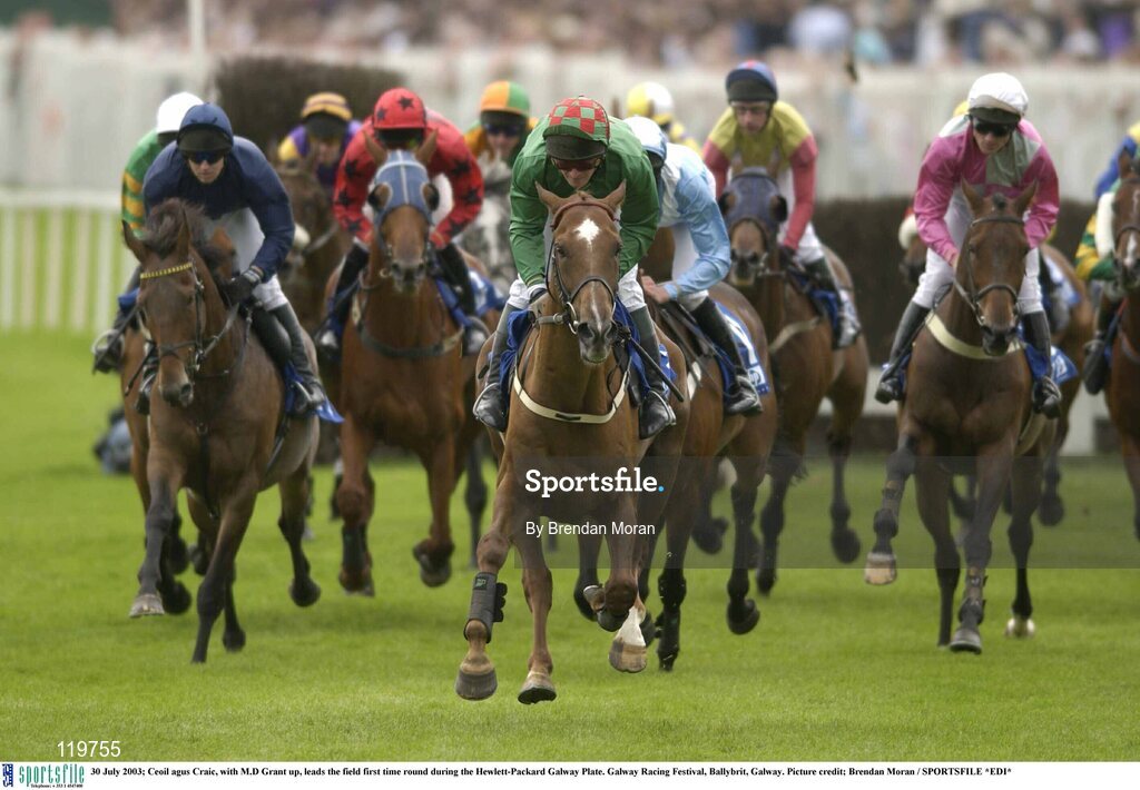 30 July 2003; Ceoil agus Craic, with M.D Grant up, leads the field first time round during the Hewlett-Packard Galway Plate. Galway Racing Festival, Ballybrit, Galway. Picture credit; Brendan Moran / SPORTSFILE *EDI*