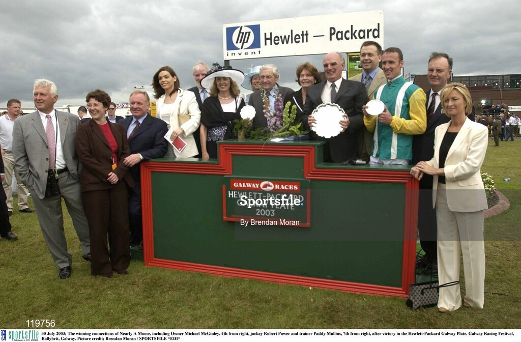 30 July 2003; The winning connections of Nearly A Moose, including Owner Michael McGinley, 4th from right, jockey Robert Power and trainer Paddy Mullins, 7th from right, after victory in the Hewlett-Packard Galway Plate. Galway Racing Festival, Ballybrit, Galway. Picture credit; Brendan Moran / SPORTSFILE *EDI*