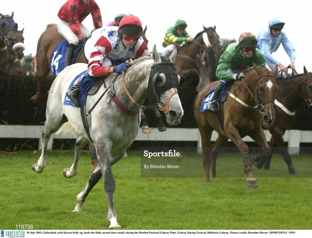 30 July 2003; Zafarabad, with Kieran Kelly up, leads the field, second time round, during the Hewlett-Packard Galway Plate. Galway Racing Festival, Ballybrit, Galway. Picture credit; Brendan Moran / SPORTSFILE *EDI*