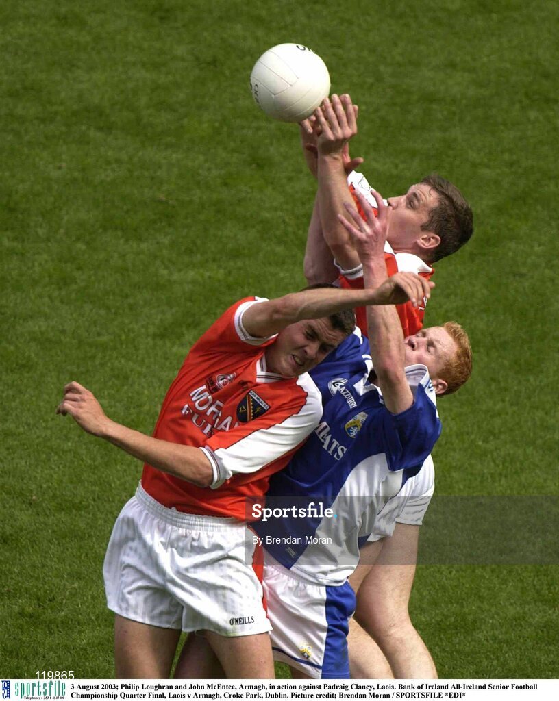 3 August 2003; Philip Loughran and John McEntee of Armagh in action against Padraig Clancy of Laois during the Bank of Ireland All-Ireland Senior Football Championship Quarter Final between Laois and Armagh at Croke Park in Dublin. Photo by Brendan Moran/Sportsfile