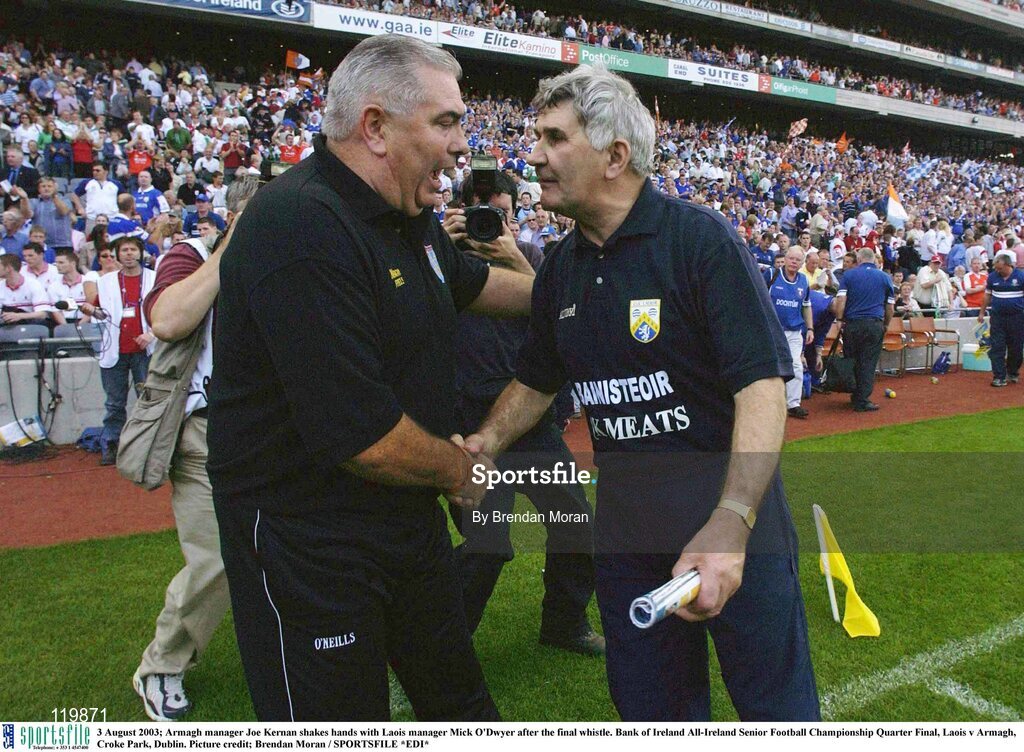 3 August 2003; Armagh manager Joe Kernan shakes hands with Laois manager Mick O'Dwyer after the final whistle of the Bank of Ireland All-Ireland Senior Football Championship Quarter Final between Laois and Armagh at Croke Park in Dublin. Photo by Brendan Moran/Sportsfile