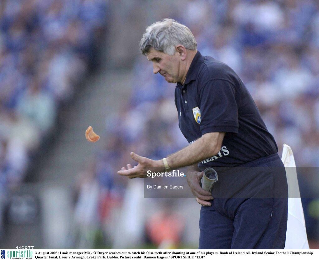 3 August 2003; Laois manager Mick O'Dwyer reaches out to catch his false teeth after shouting at one of his players during the Bank of Ireland All-Ireland Senior Football Championship Quarter Final between Laois and Armagh at Croke Park in Dublin.   Photo by Damien Eagers/Sportsfile