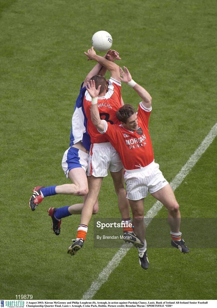 3 August 2003; Kieran McGeeney and Philip Loughran of Armagh in action against Padraig Clancy of Laois during the Bank of Ireland All-Ireland Senior Football Championship Quarter Final between Laois and Armagh at Croke Park in Dublin. Photo by Brendan Moran/Sportsfile