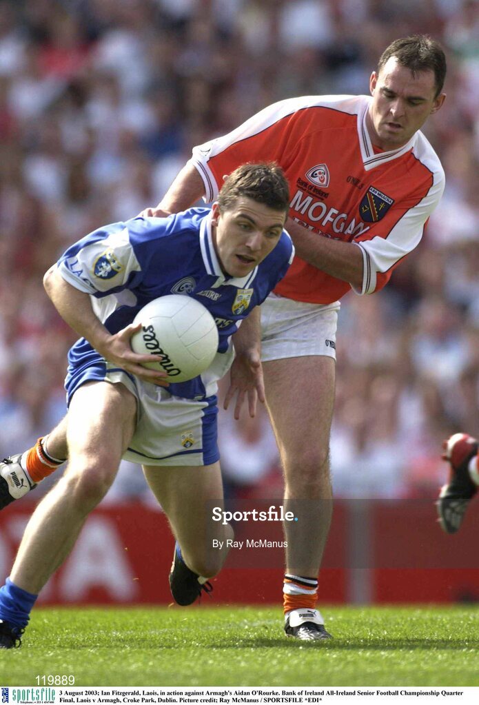 3 August 2003; Ian Fitzgerald of Laois in action against Aidan O'Rourke of Armagh during the Bank of Ireland All-Ireland Senior Football Championship Quarter Final between Laois and Armagh at Croke Park in Dublin. Photo by Ray McManus/Sportsfile