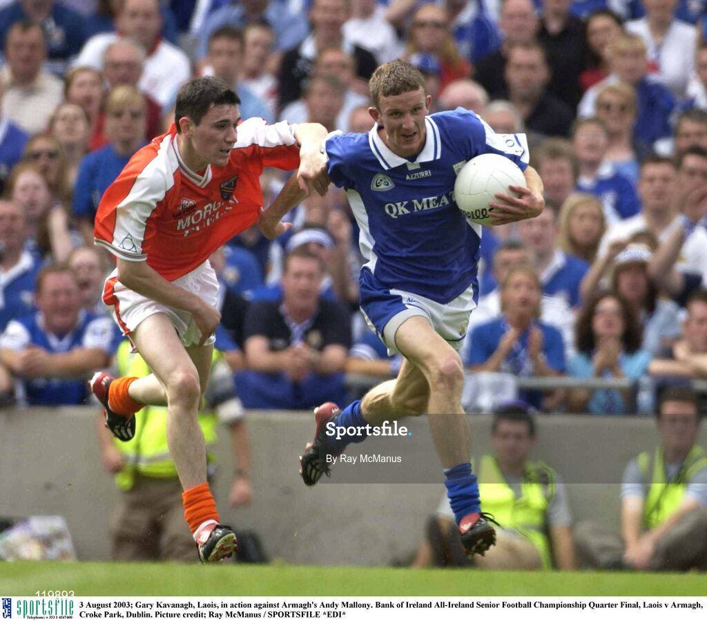 3 August 2003; Gary Kavanagh of Laois in action against Andy Mallony of Armagh during the Bank of Ireland All-Ireland Senior Football Championship Quarter Final between Laois and Armagh at Croke Park in Dublin. Photo by Ray McManus/Sportsfile