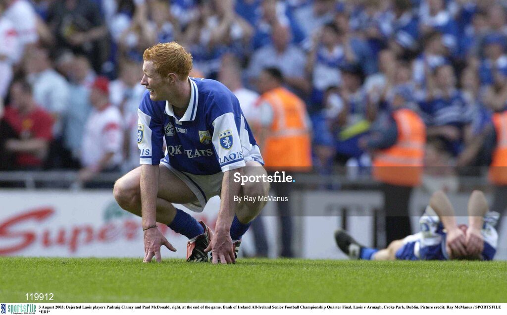 3 August 2003; Padraig Clancy and Paul McDonald of Laois dejected after the Bank of Ireland All-Ireland Senior Football Championship Quarter Final between Laois and Armagh at Croke Park in Dublin. Photo by Ray McManus/Sportsfile